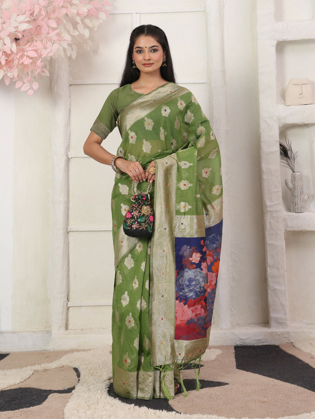 Classic green linen cotton saree with matching green blouse.