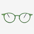 Highland rounded eyeglasses in titanium and wood with gold, green, brown, and grey color details