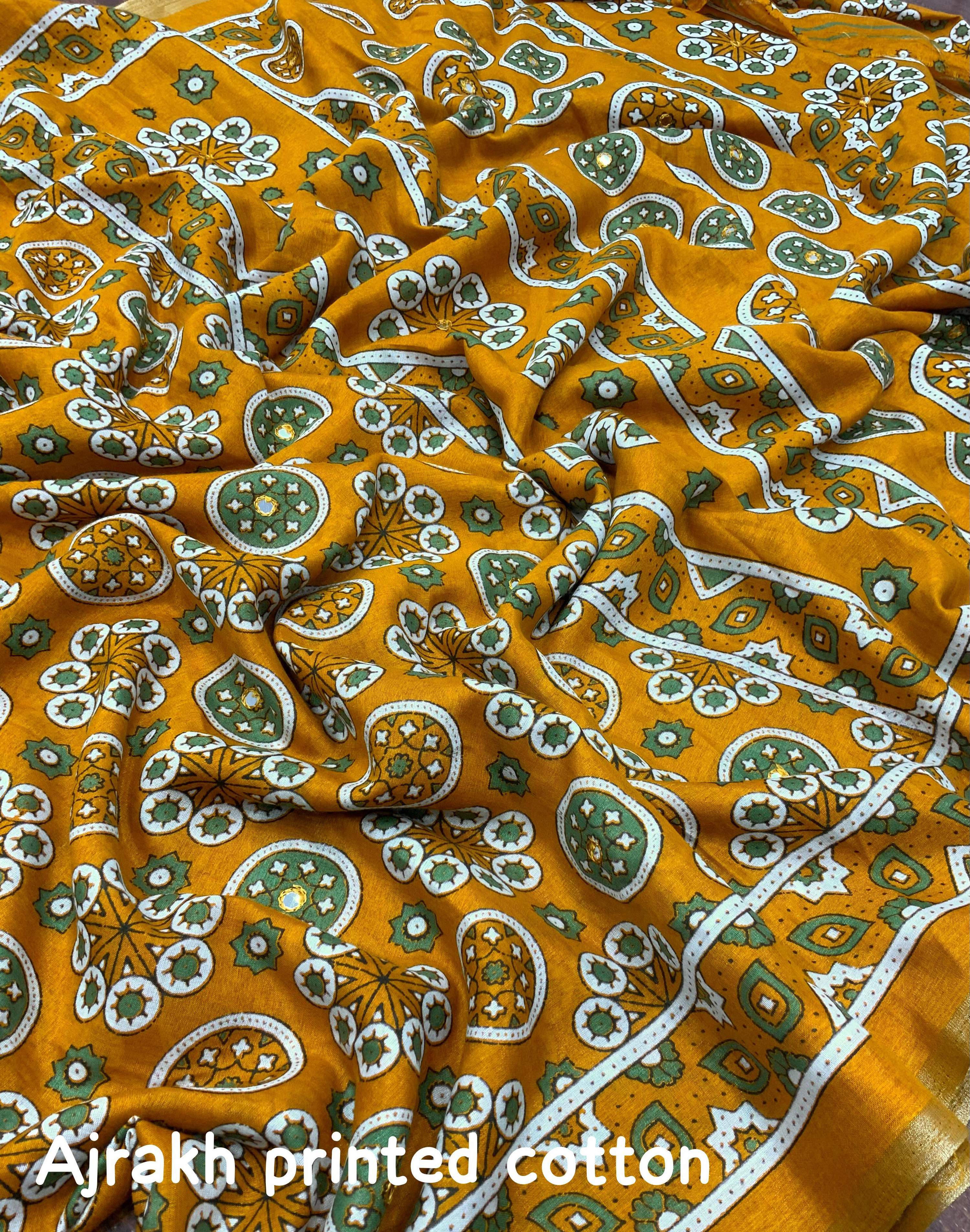 Mustard Cotton Blend Ajrak Saree with Zari Border and Blouse Piece