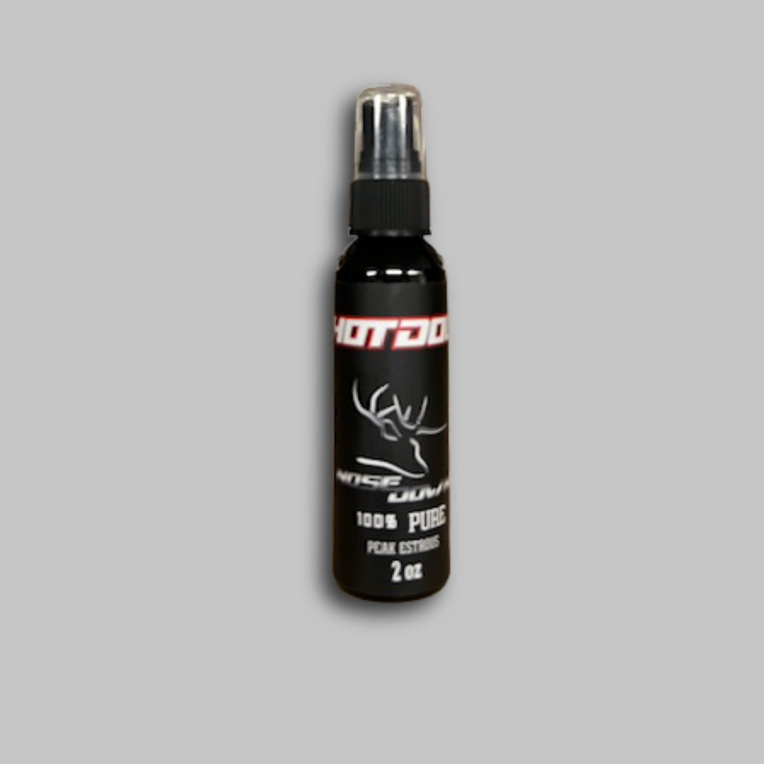 2oz black spray bottle of Hot Doe Urine with white text for outdoor hunting use