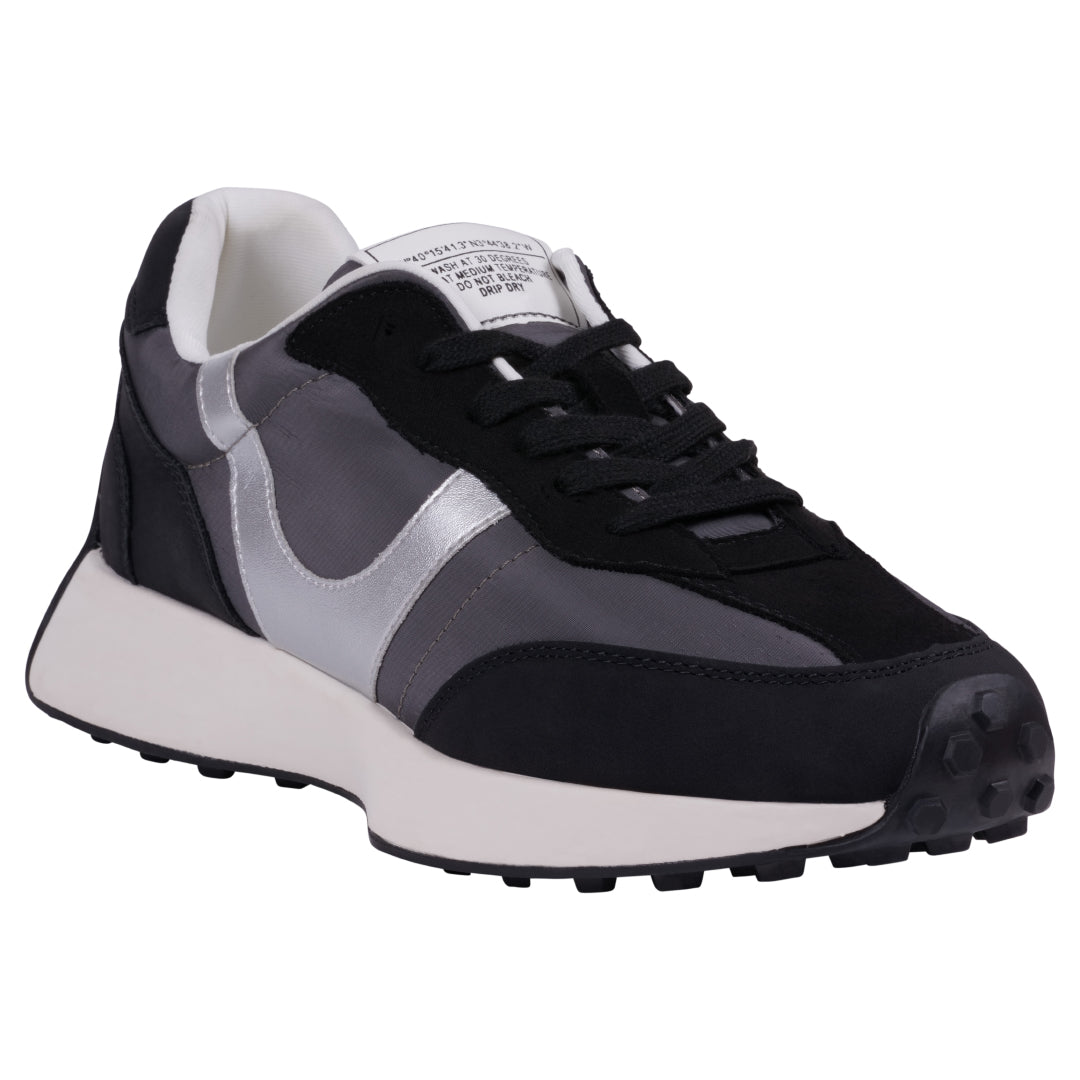 A pair of Women's Howell black lace-up sneakers shown from side profile and bottom view on a white background.