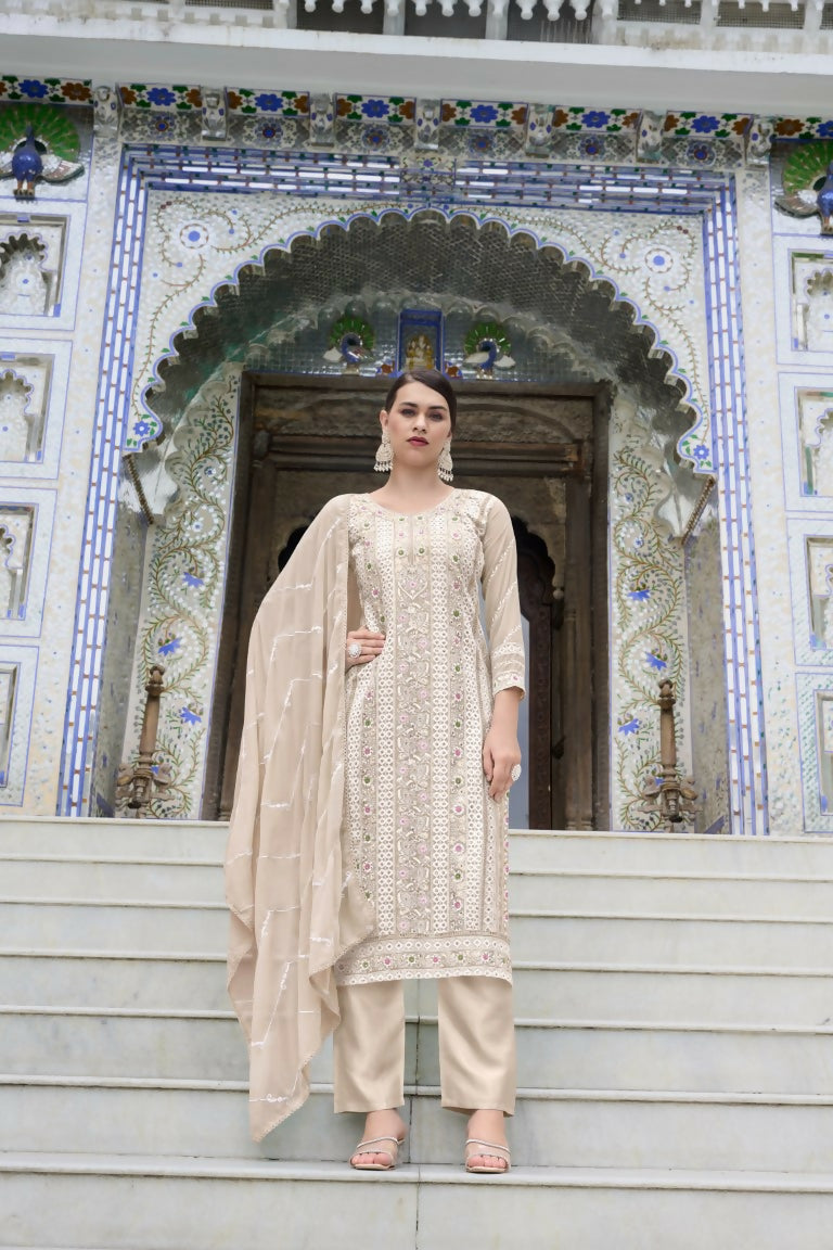 Beige Faux Georgette Kurta Set with heavy embroidery and pearl work