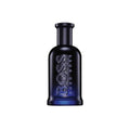 Bottle of Hugo Boss Bottled Night Eau de Toilette 3.3 fl oz in dark blue glass