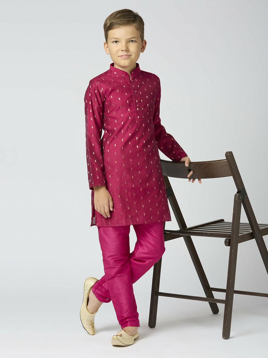 Boy wearing a traditional purple Chanderi kurta with Butta embroidery