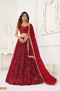 Maroon Butterfly Net Wedding Lehenga adorned with original mirror work and sequence embroidery