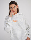 White camo unisex hoodie with I Believe in Miracles graphic text on the front