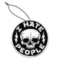 I Hate People air freshener hanging in a car, featuring a bold and humorous design for the daily commute.