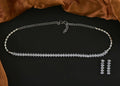 Silver white necklace set with Jadau Kundan, pearls, and American Diamonds.