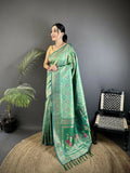 Aqua green soft silk saree with geometric pattern and matching unstitched blouse piece