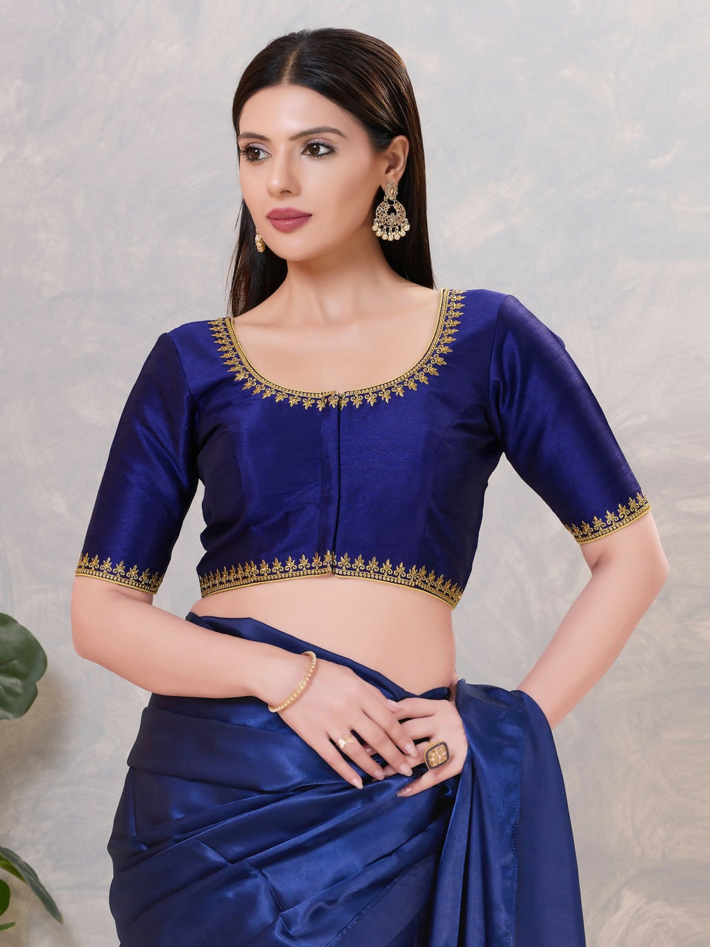 Navy-blue round neck silk blouse with embroidery details