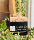 Minimalist beige and black Sandalwood-Vanilla artisan soap bar from the Vela Deluxe Collection.