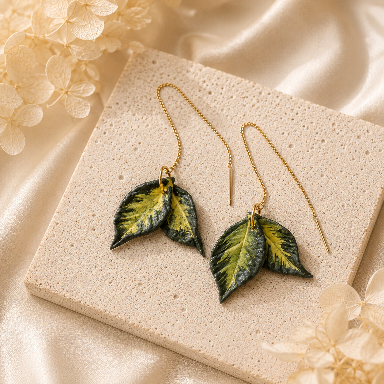 Hoya Polyneura threader earrings with green and yellow polymer clay leaves and gold metal