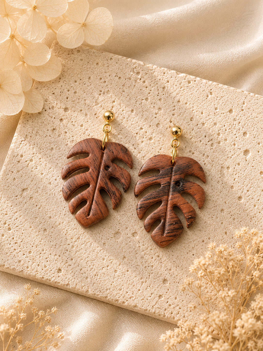 Terracotta wood grain Monstera leaf dangle earrings with gold details