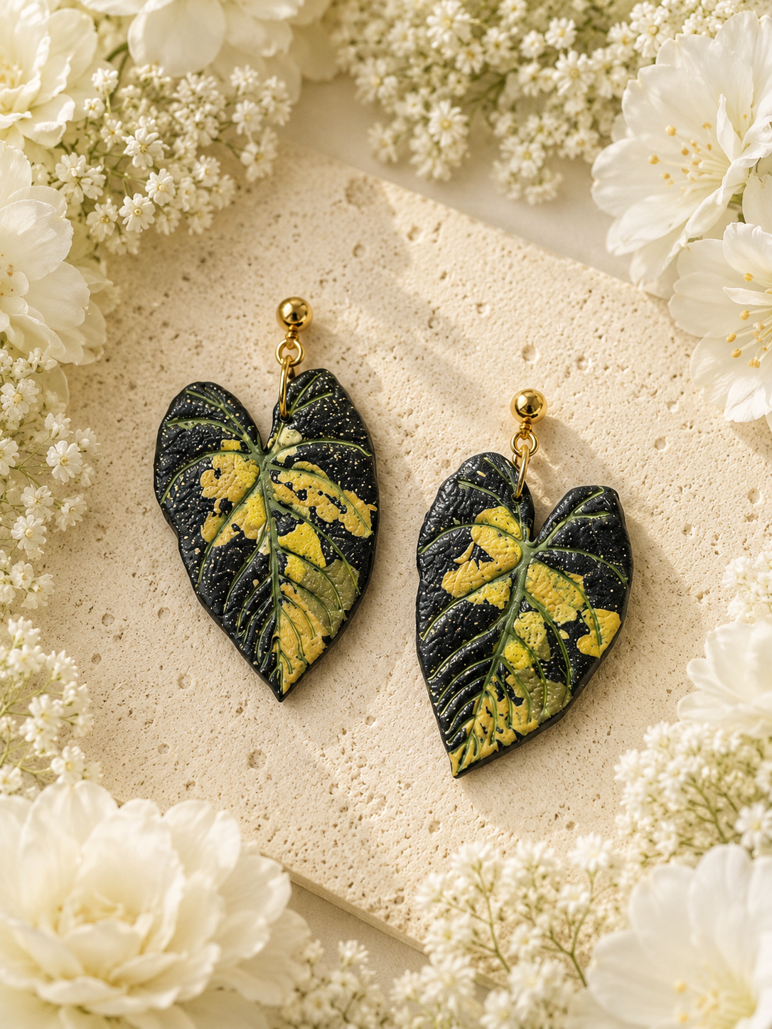 Lava Maharani Alocasia botanical earrings in black, green, and yellow polymer clay