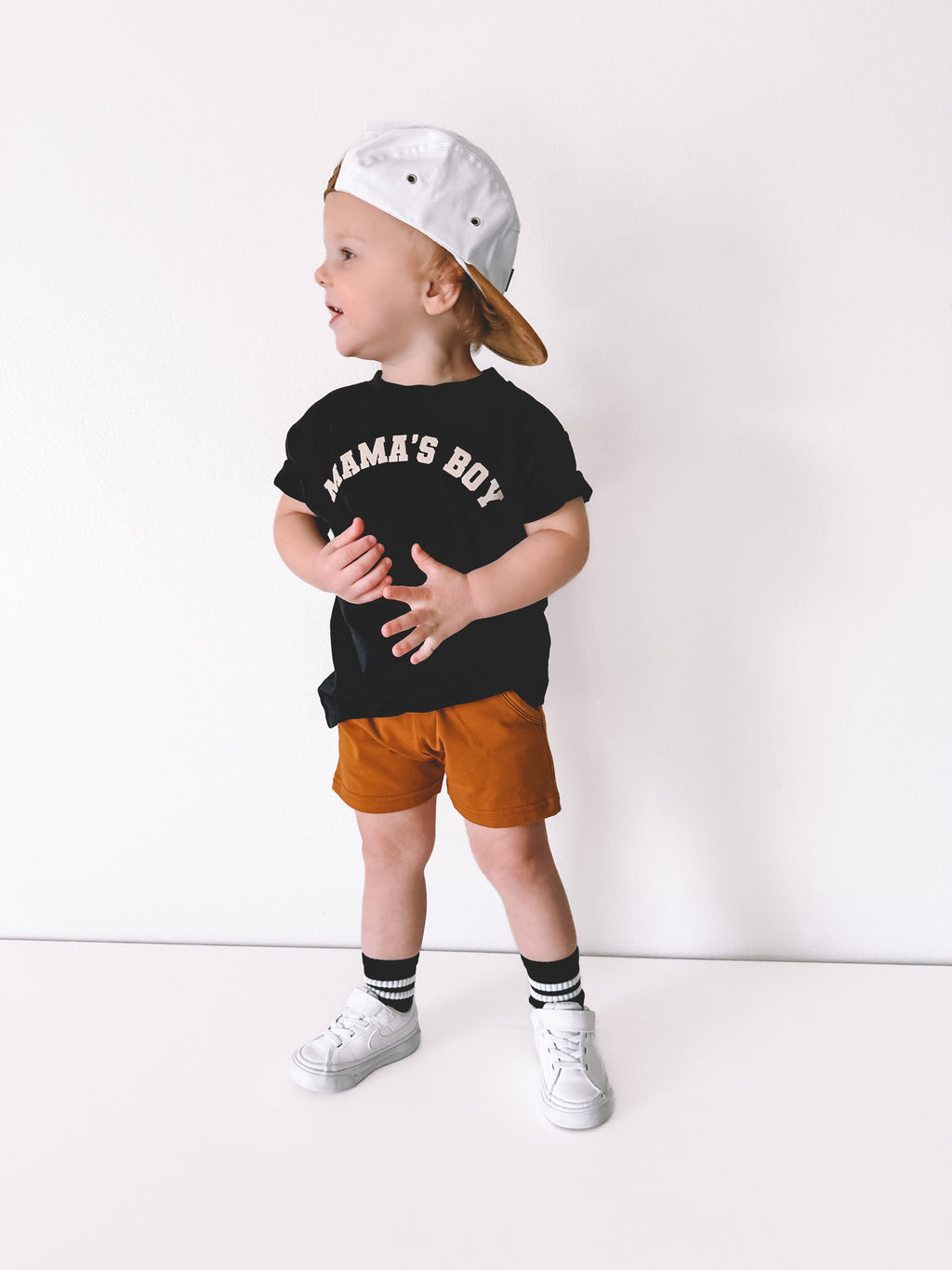 Classic crew neck kids t-shirt with Mama's Boy graphic text.