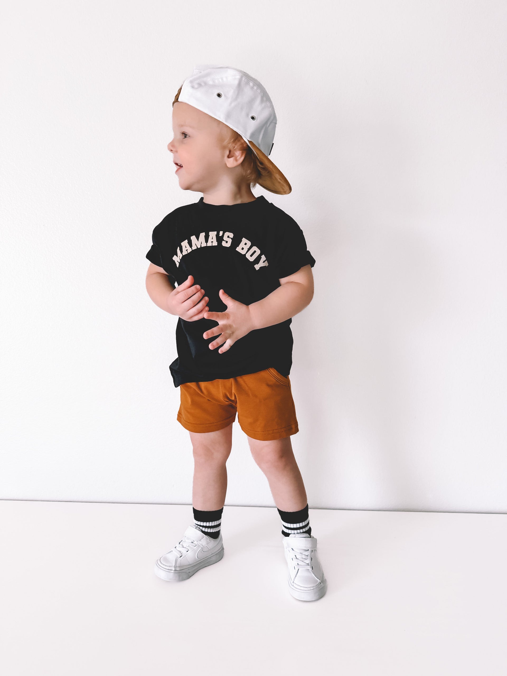 Classic crew neck kids t-shirt with Mama's Boy graphic text.