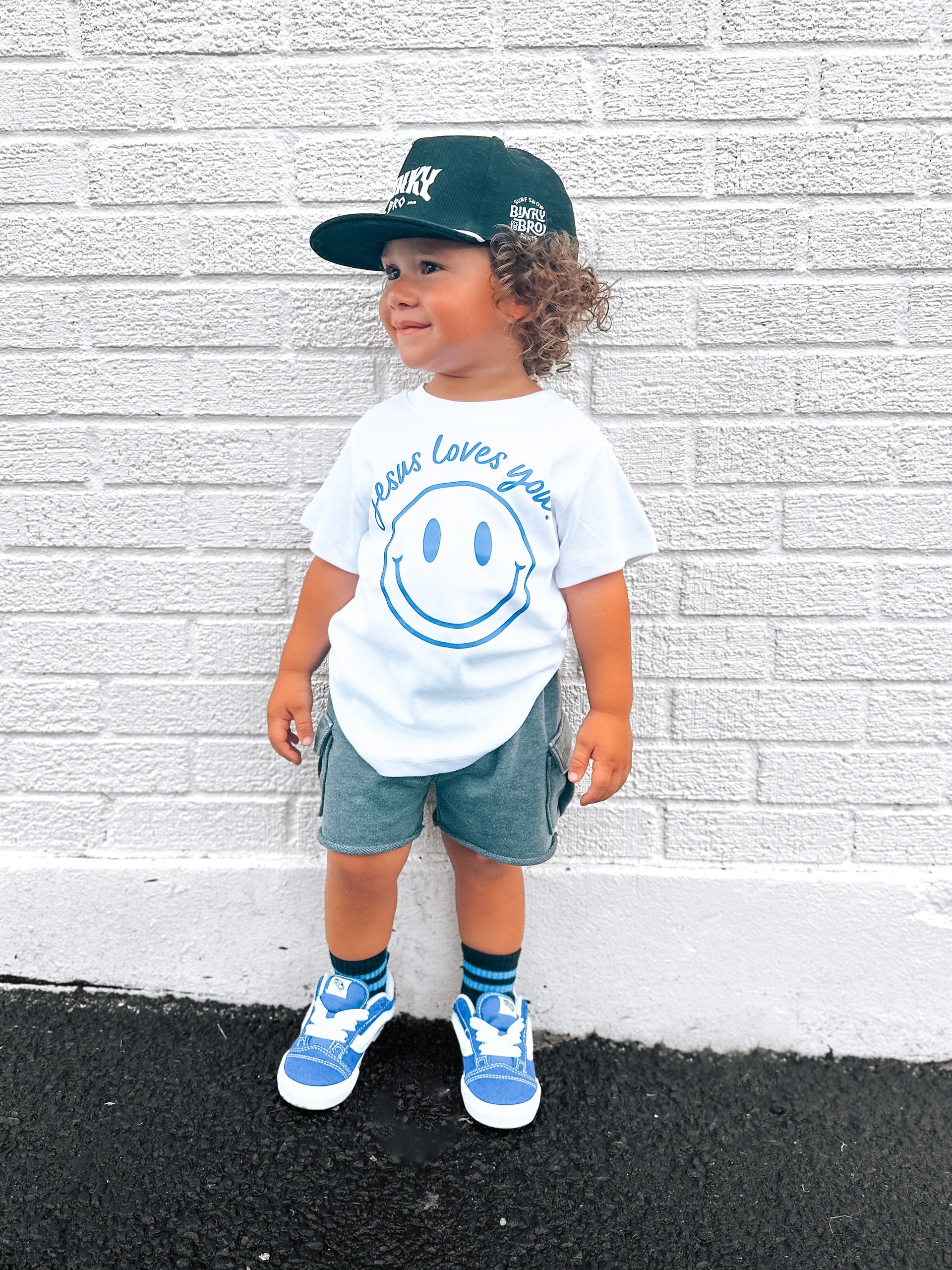 Jesus Loves You Smiley Toddler Tee in White Blue and Pink