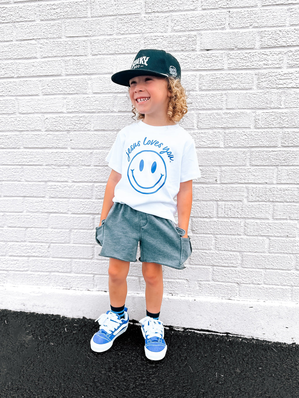 Jesus Loves You Smiley Toddler Tee in White Blue and Pink