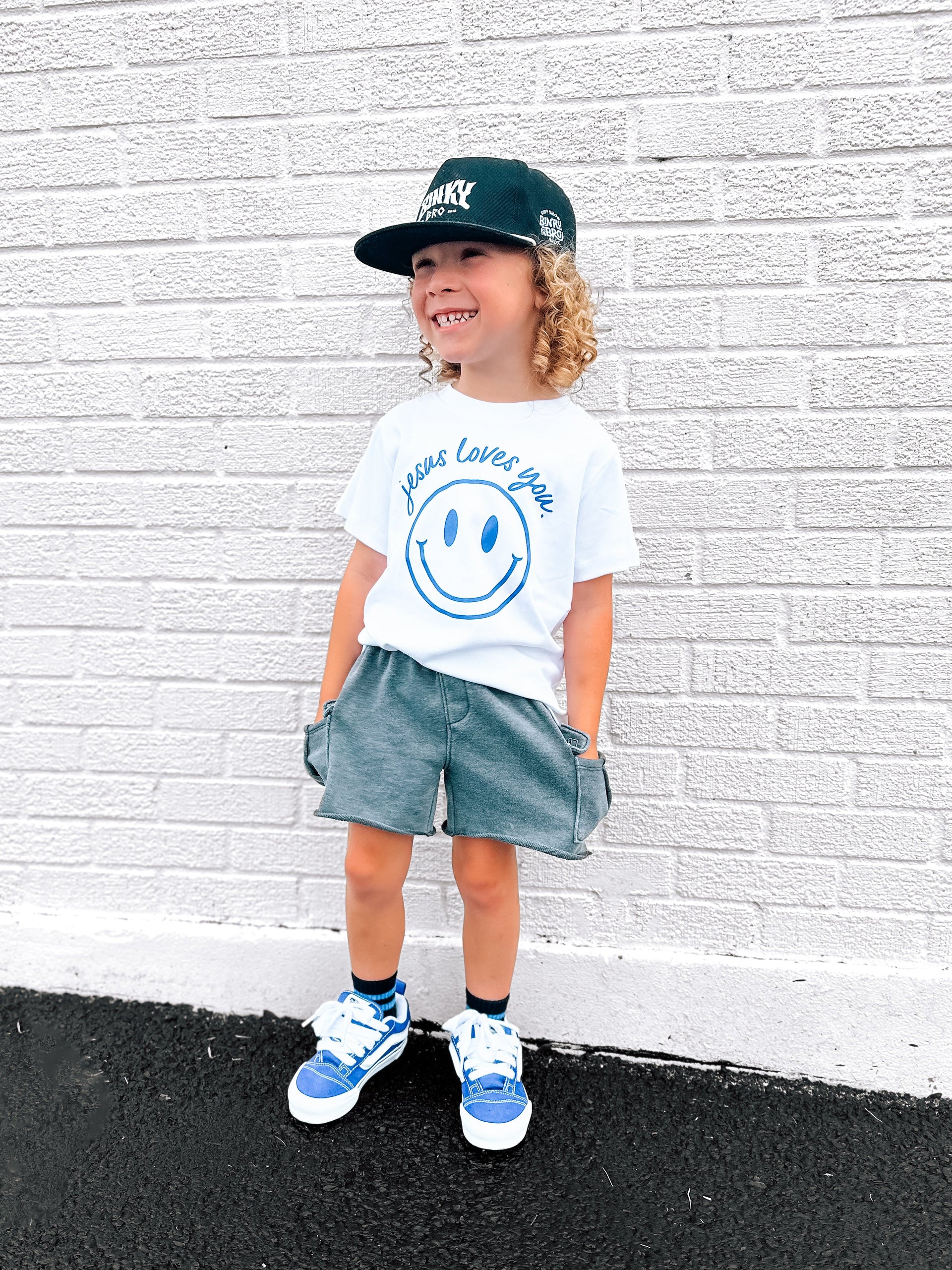 Jesus Loves You Smiley Toddler Tee in White Blue and Pink