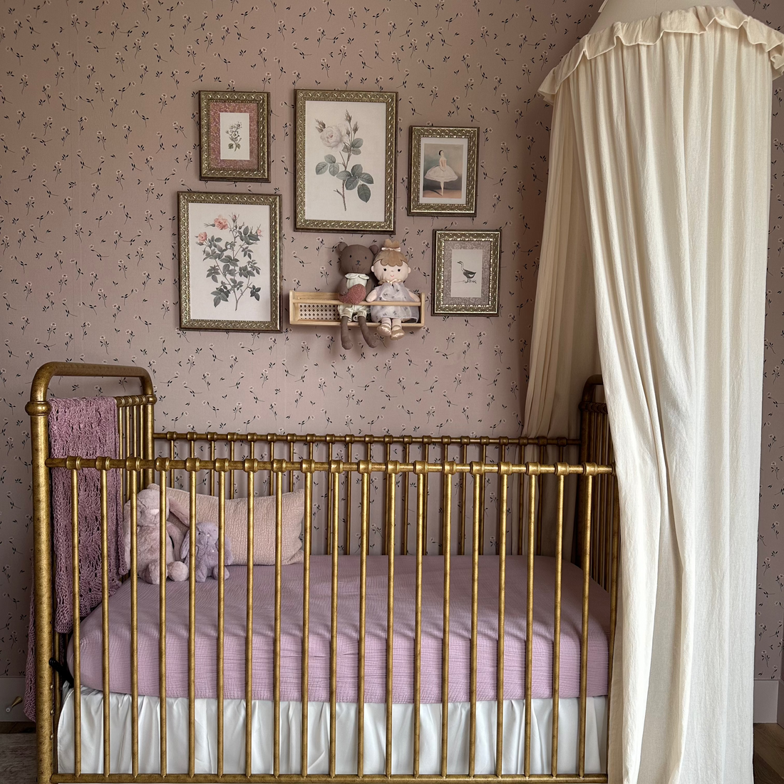 Brigitta floral wallpaper featuring dusty-rose, off-white, and muted-green romantic botanical patterns.