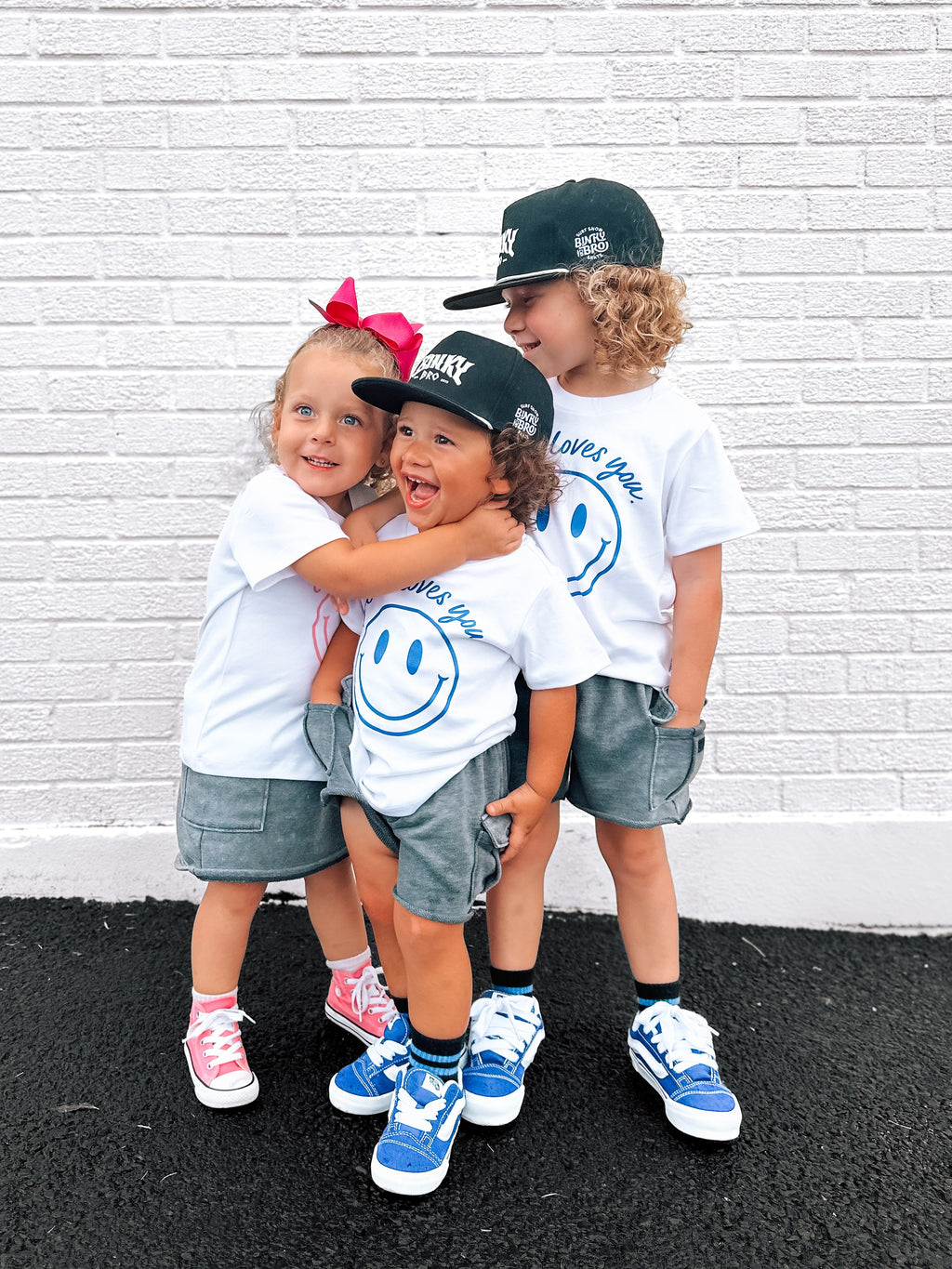 Jesus Loves You Smiley Toddler Tee in White Blue and Pink