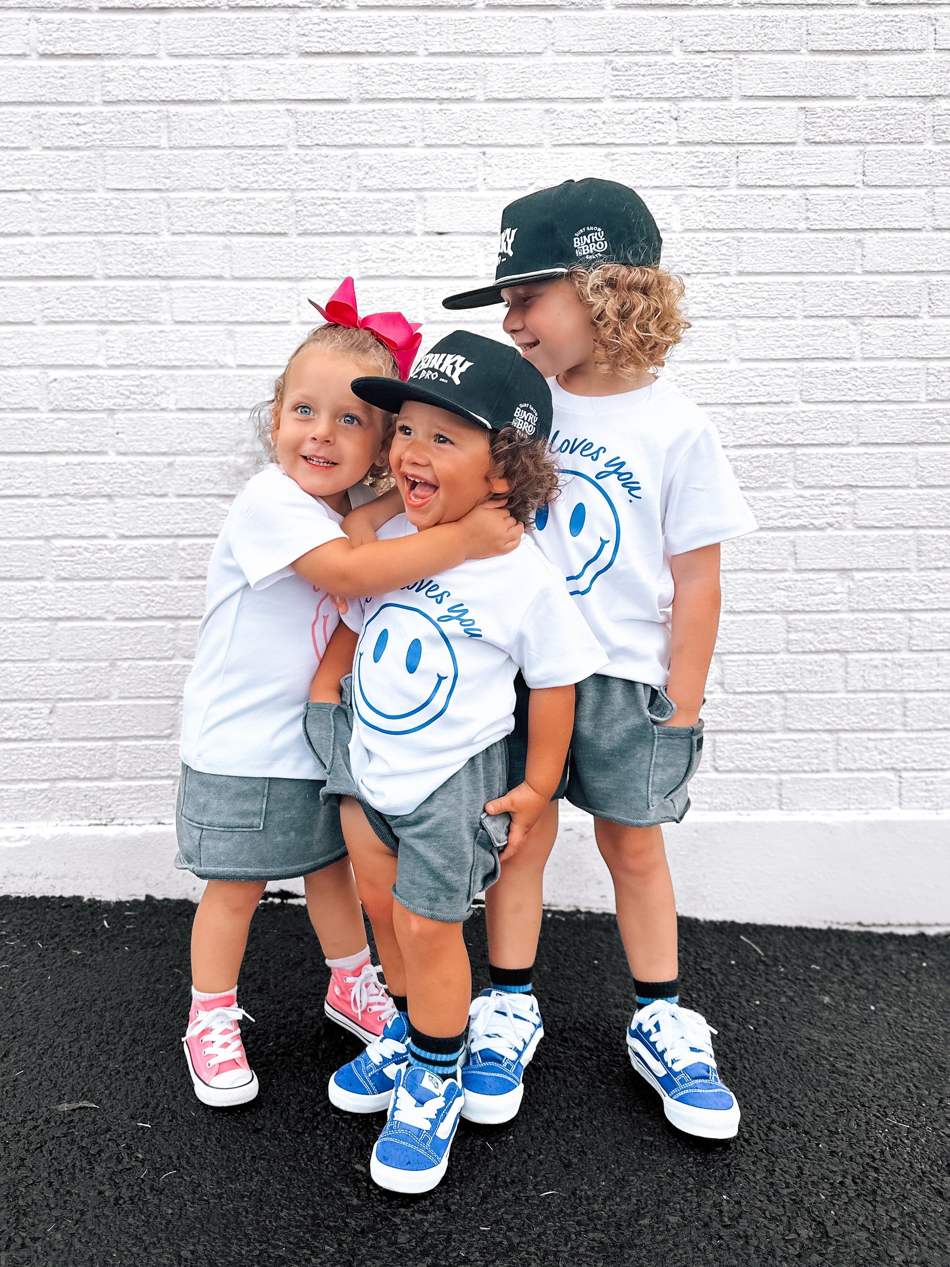 Jesus Loves You Smiley Toddler Tee in White Blue and Pink
