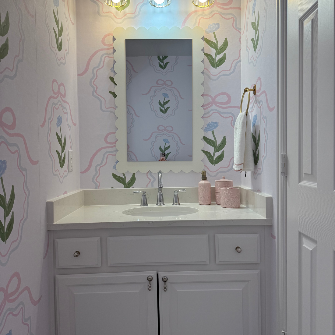 Esti floral wallpaper with pink, white, light-blue, and sage-green botanical pattern