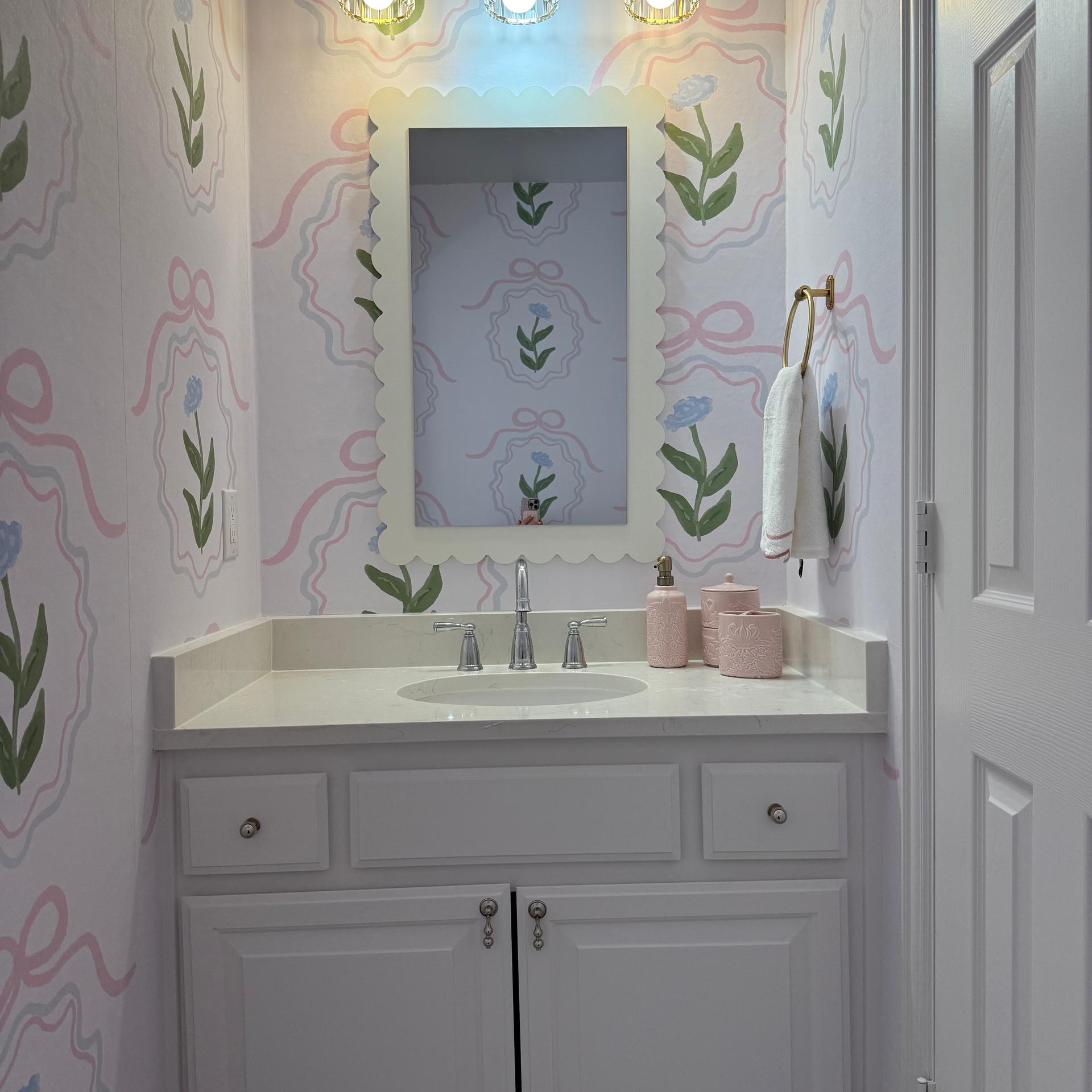Esti floral wallpaper with pink, white, light-blue, and sage-green botanical pattern