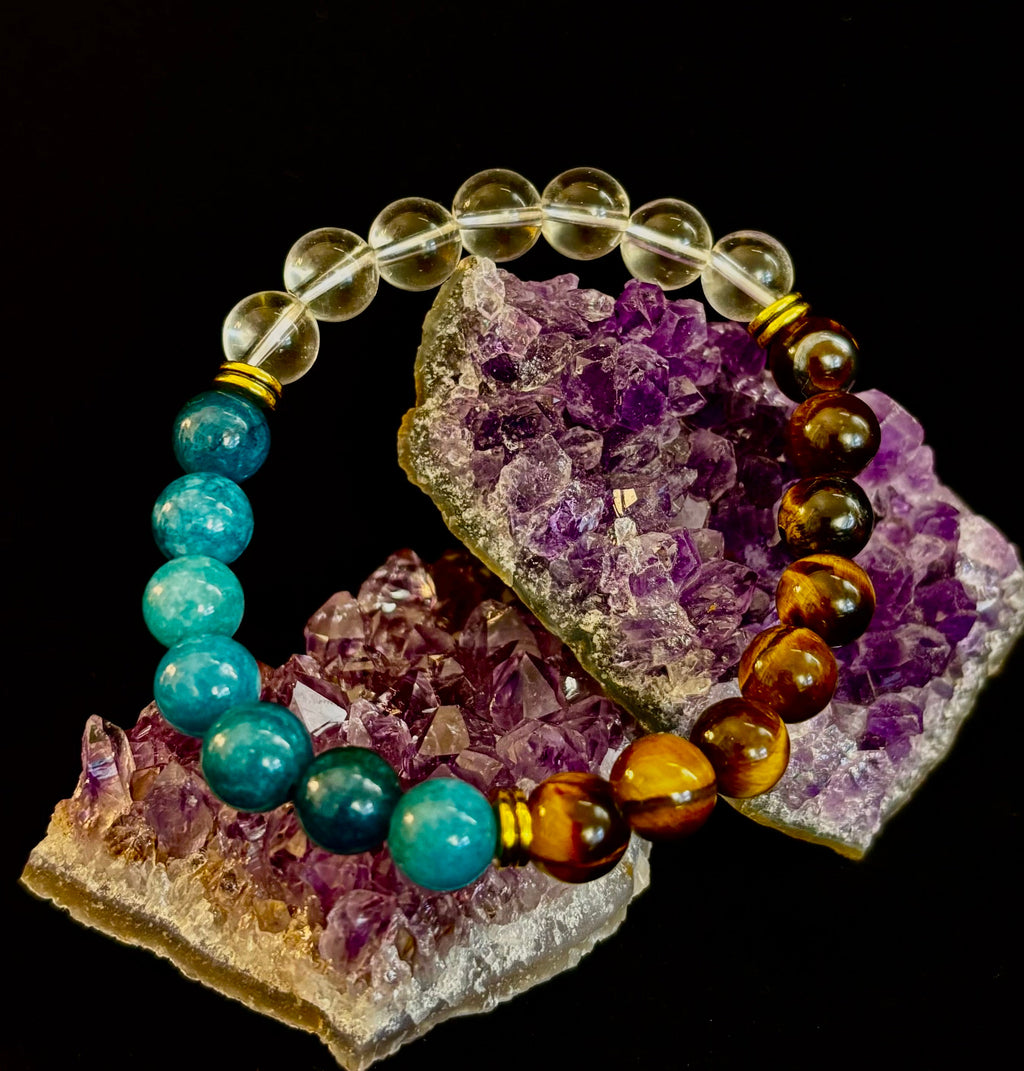 A beaded intention bracelet featuring blue apatite, brown tiger eye, and clear quartz gemstones with gold-tone accents.