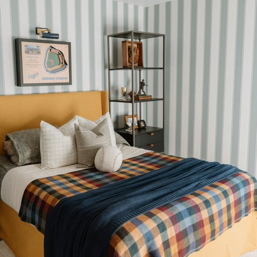 Andy striped removable wallpaper in blue, white, pink, and cream stripes