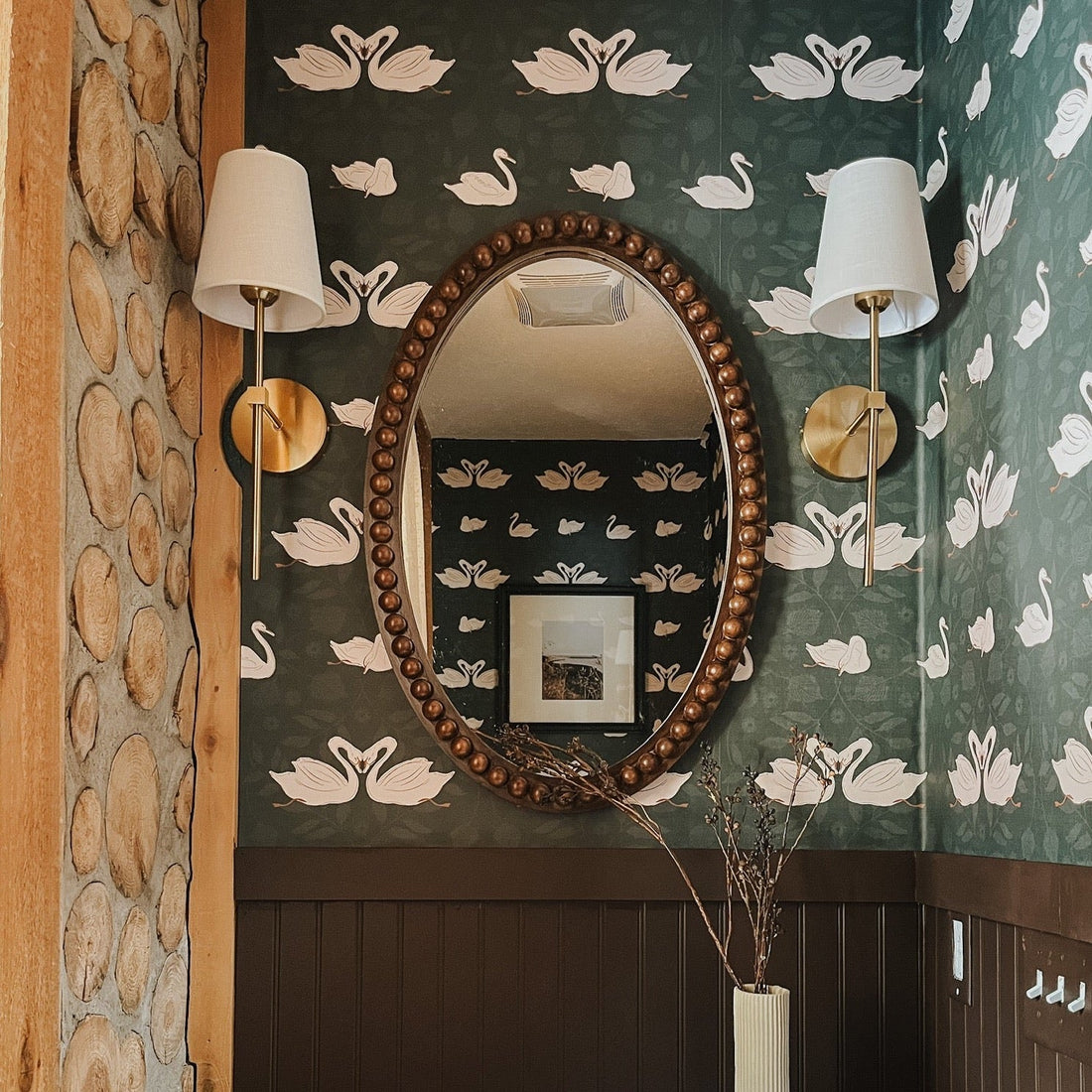 Sevan botanical animal print wallpaper in green, white, and tan
