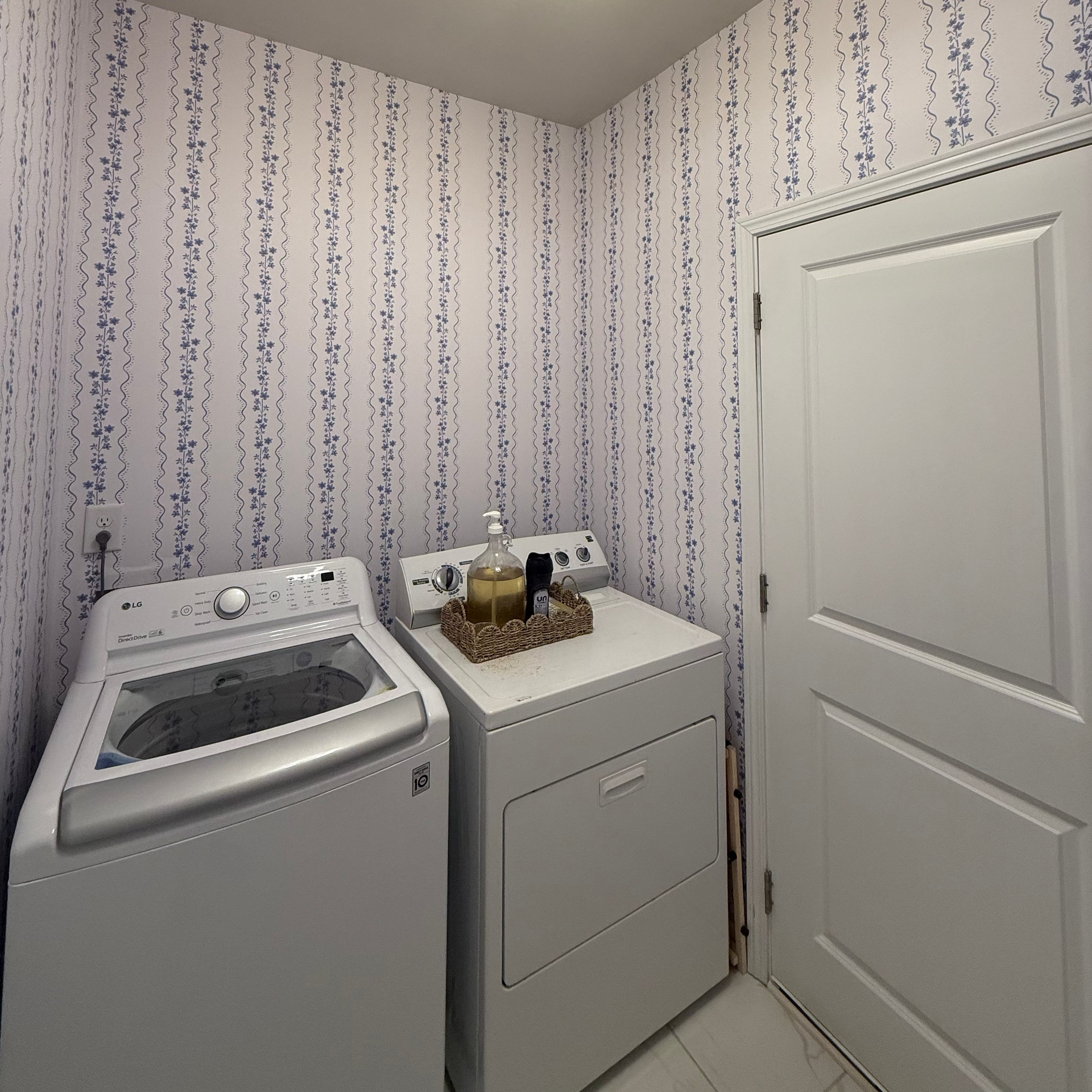 Brooke floral wallpaper design by Ashleigh Fish in green, white, blue, and beige