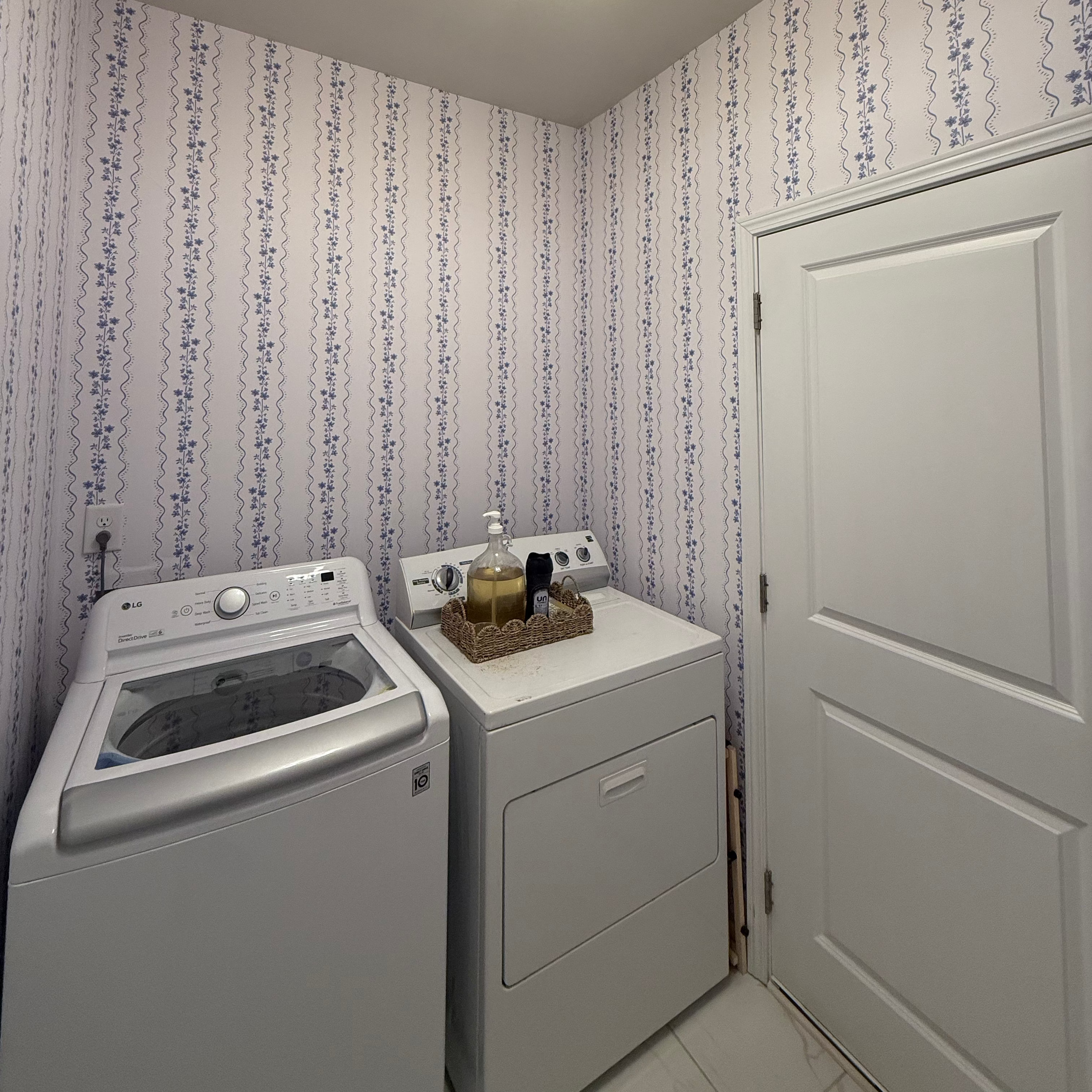 Brooke floral wallpaper design by Ashleigh Fish in green, white, blue, and beige