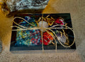 Bohemian-style caregiver wellness and healing gift box in neutral tones