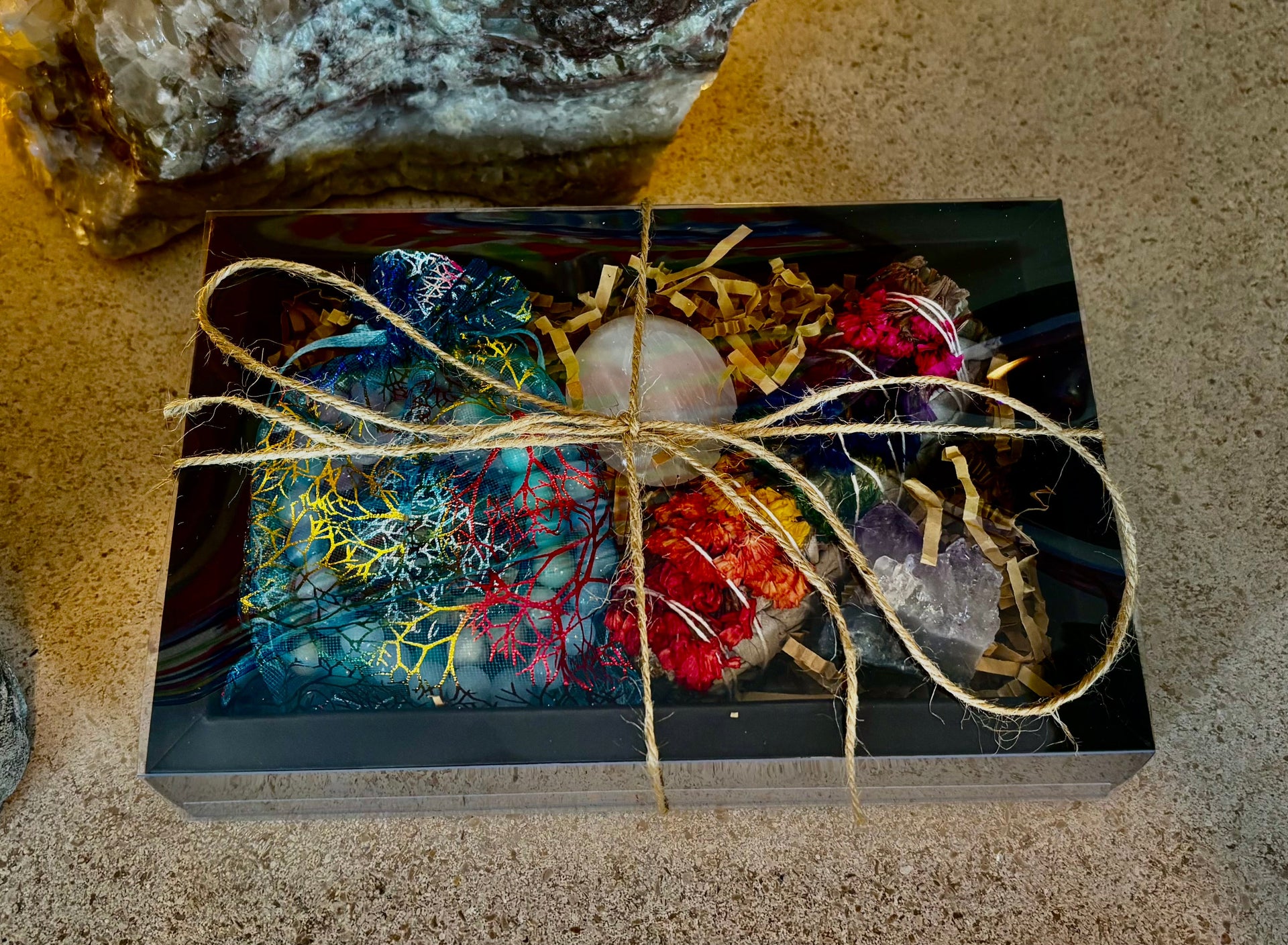 Bohemian-style caregiver wellness and healing gift box in neutral tones