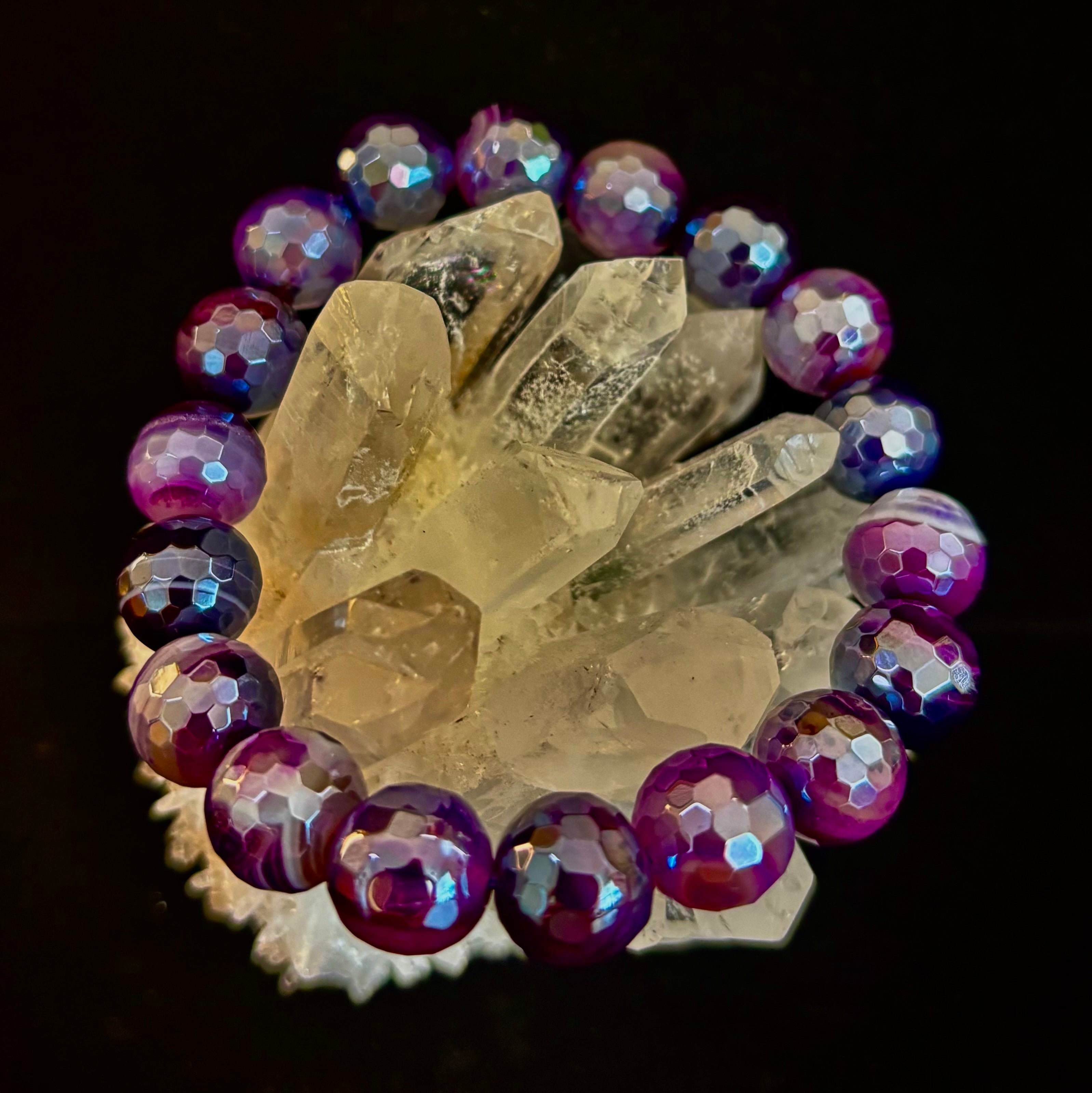 Faceted Mystic Purple Banded Agate stretch bracelet featuring swirling violet and plum gemstone beads.
