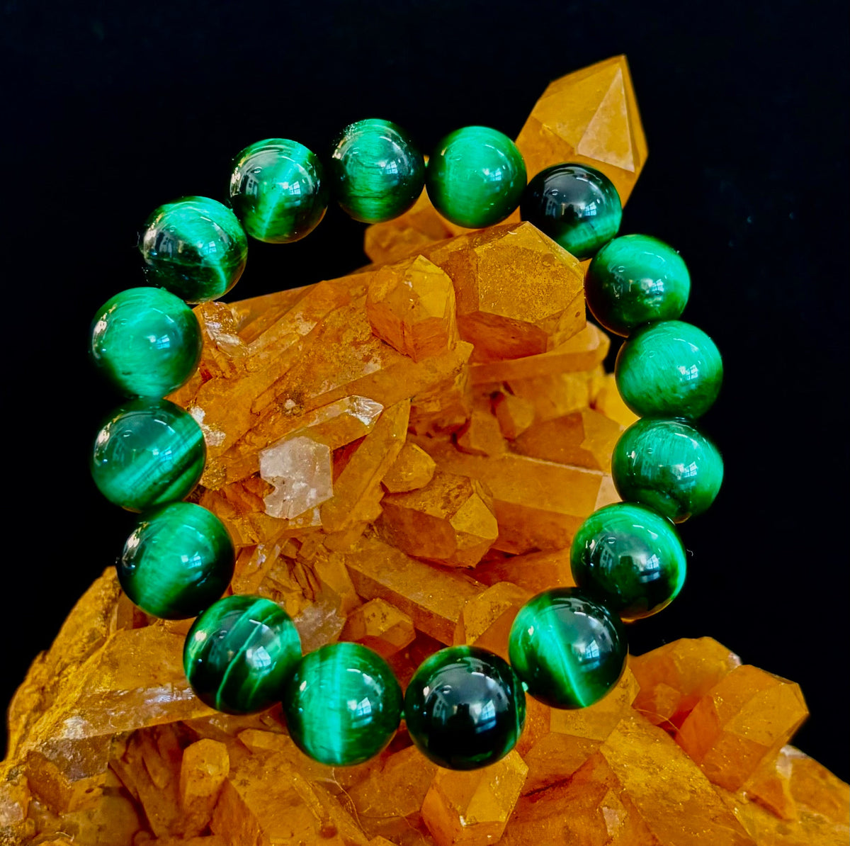 Wicked Glam Green Tiger Eye statement bracelet featuring bold 12mm green gemstone beads.