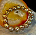 Champagne Glow Faceted Agate beaded bracelet with shimmering neutral-toned stones.