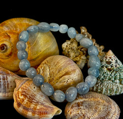Natural blue tumbled aquamarine stone bracelet with a minimalist bohemian design.