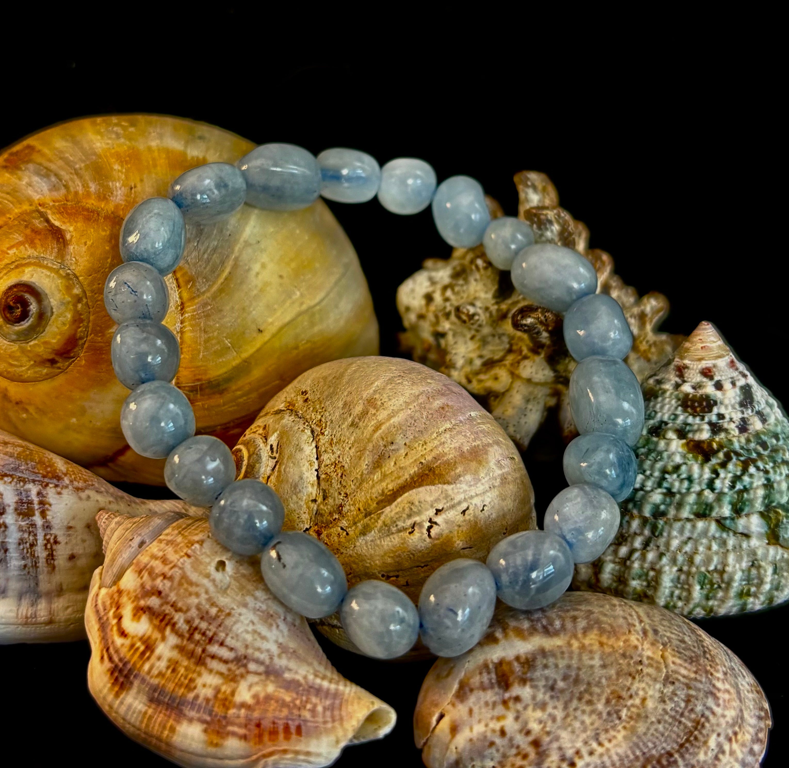 Natural blue tumbled aquamarine stone bracelet with a minimalist bohemian design.