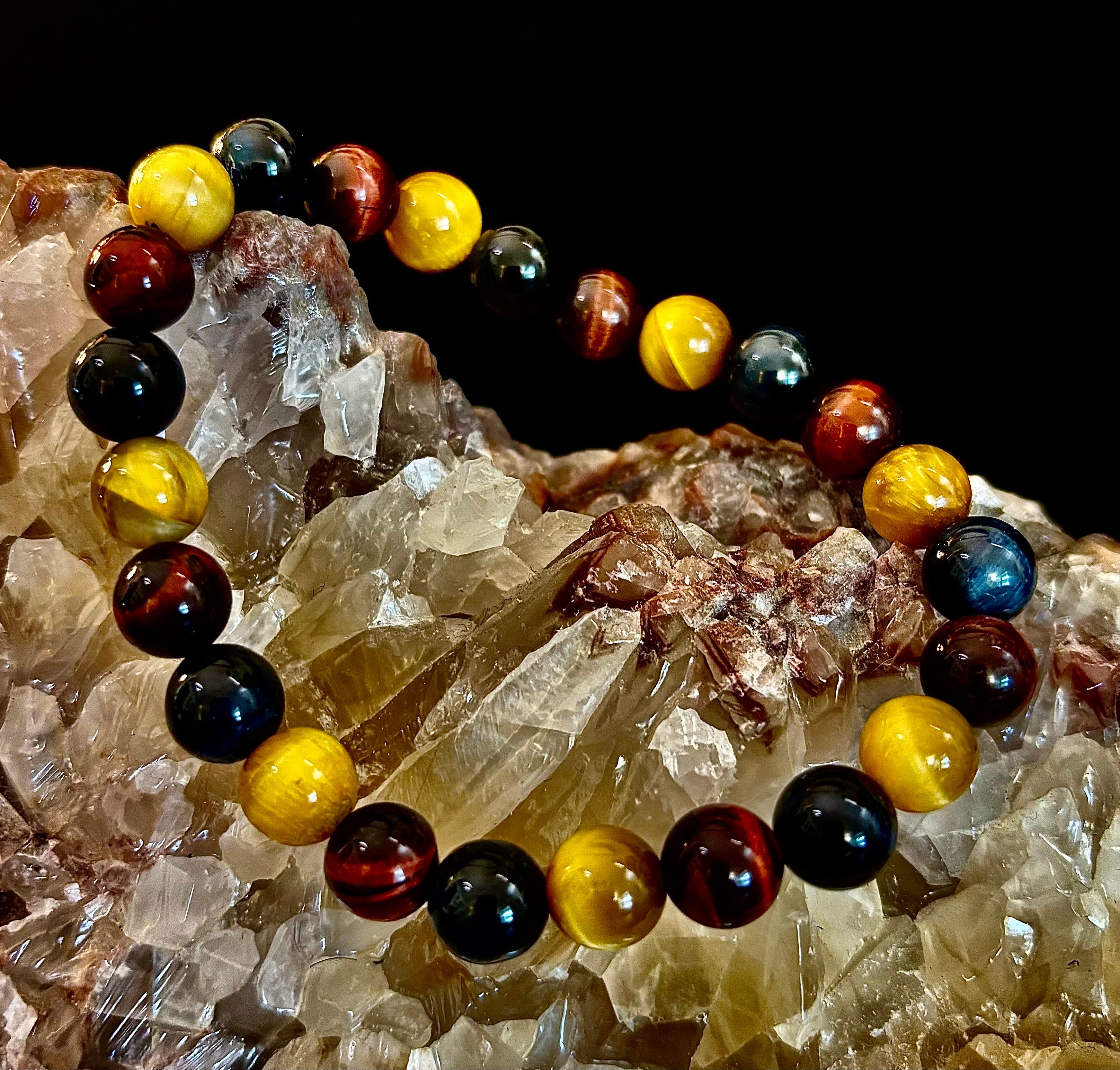 Triple Power Tiger Eye Bracelet featuring yellow, brown, and blue stones in a bohemian style.