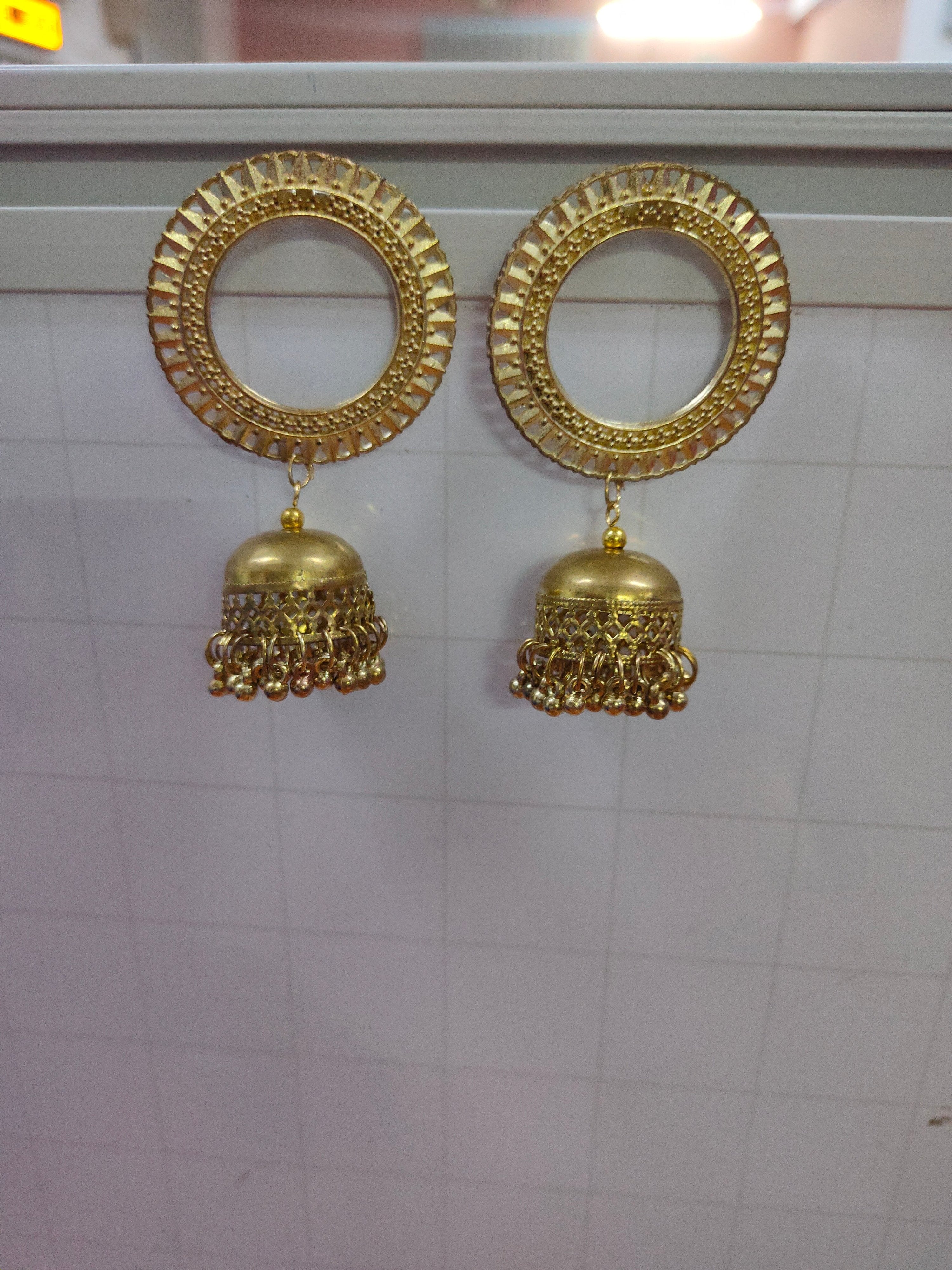 Gold colored traditional sun shape Jhumka earrings