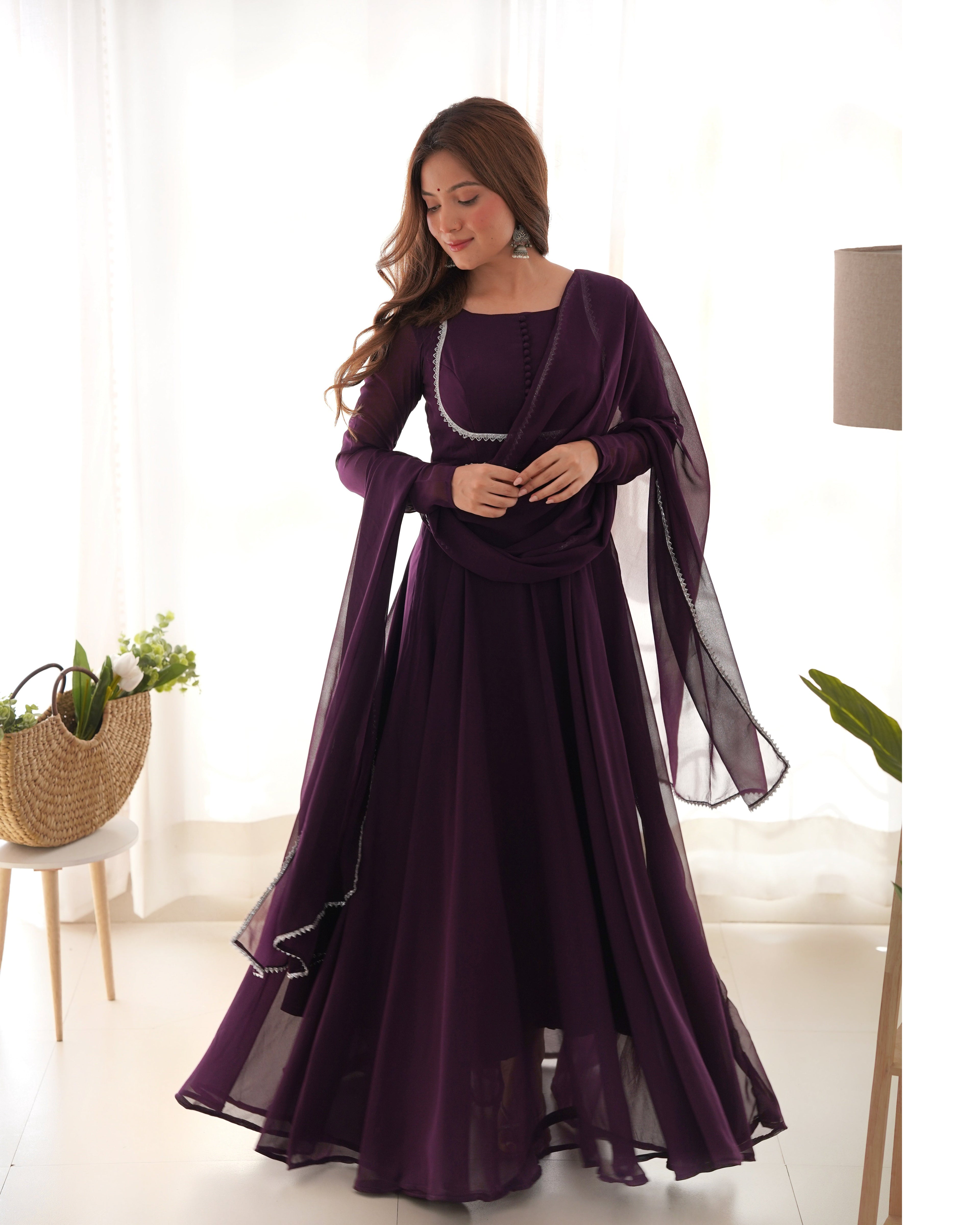 Elegant wine-colored georgette Anarkali gown with designer yoke and matching pant and dupatta