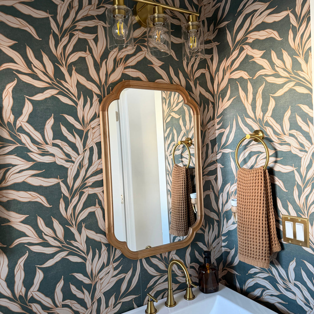 Oaks pattern wallpaper by Taddy Mikelaites on a neutral interior wall