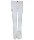 A pair of white stretch denim jeans featuring silver glitter star accents on the hip and lower leg.