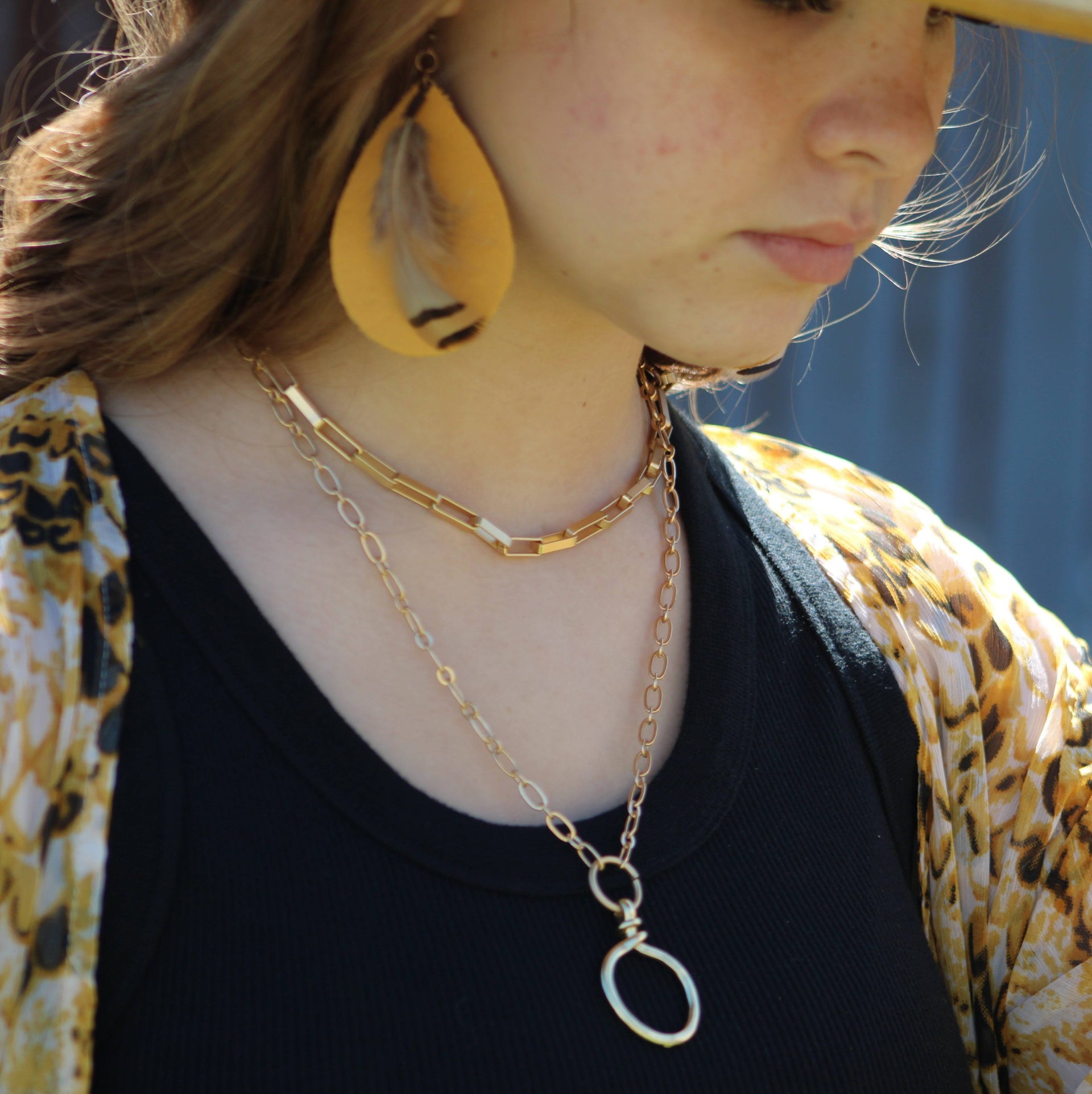 Mustard Teardrop Leather Earrings with Natural Feather Accents - Image 2