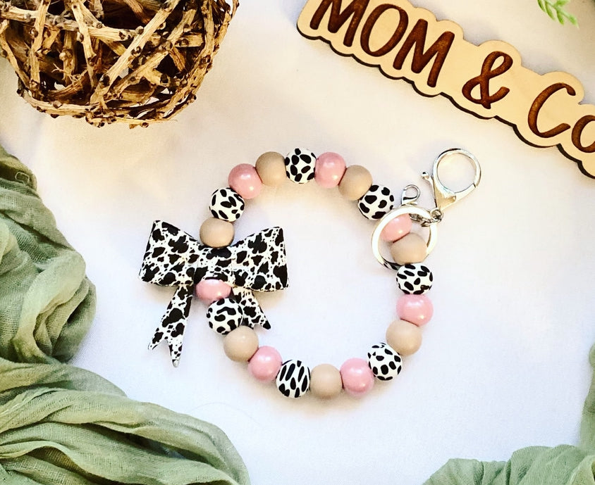 Pink Cowprint Bow Bead Wristlet
