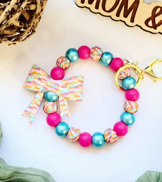 Pink Brush Bow Bead Wristlet