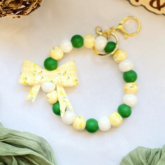 Lemondrop Bow Bead Wristlet