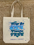 Keep The Sea Plastic Free eco-friendly cotton tote bag in beige, blue, and green tones.